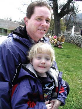 (l-r) Mike Berg with son Ross at the  Annual Frazier Mountain Park Easter Egg Hunt and Potluck in 2006.
