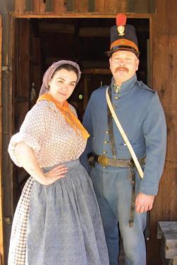 Fort Tejon Historical Association Chair Lana Bailey with U.S. Dragoons Private Dave Held preparing for Fourth of July at the fort, which has been given a reprieve this year to stay open and active for the public.