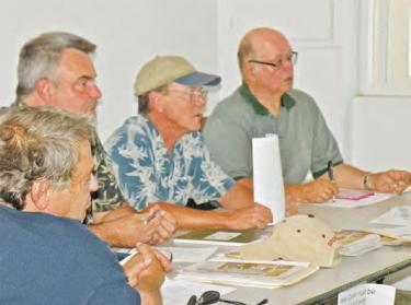 Oso Town Council board and members who had somber issues to cover at their meeting August 30. [Hedlund photo]