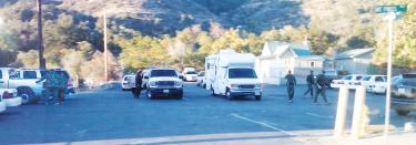 Kern County Sheriff's SWAT team assembled in the parking lot of Frazier Park Market early on Monday morning, Sept.17. [photo by Robin Steere]