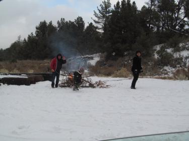  Snow bunnies near Darling Road got a little chilly and...yes...lit a fire. Flying sparks are still a concern to nearby homeowners, even with snow on the ground. [Dawn Jenkins photo]
