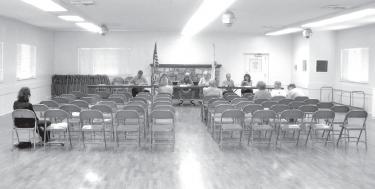 One Big Empty Room: The Board of Directors of the Frazier Park Public Utilities District speaks to six of the seven who attended its Water Rate Increase Workshop on Saturday, August 11.
