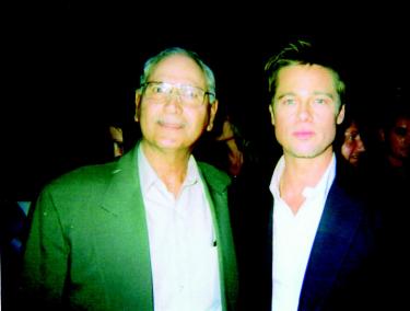 Dennis Penna (l) mugs it up with Brad Pitt at the premier of Babel, which was nominated for seven Oscars last week.
