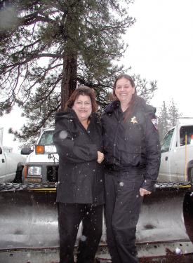 As snow falls, Suellyn L'Dera thanked Suzy Ray-Goulart of the Pine Mountain Club Security Patrol for using a PMC pickup to take the injured woman to meet Hall Ambulance, which refused to come into Pine Mountain Thursday, Jan. 25.


