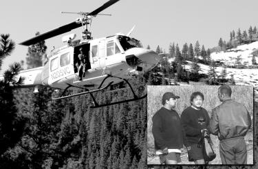 Ventura County Sheriff Sgt. Frank Underlin helps guide the pilot into the landing zone at the Mil Potrero ?Y? Monday morning. Inset: Victor Herrera (left) and Greg Kimura (center) speak with a Ventura County sheriff?s deputy after being rescued from the slopes of Mt. Pi?os.
