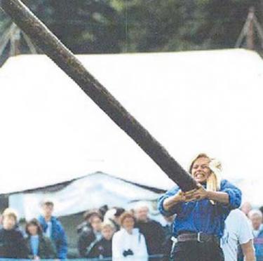 Cynthia Morrison tosses a caber at the professional Highland Games in Scotland. She is a graduate of Lockwood Valley?s American Jousting Alliance.


