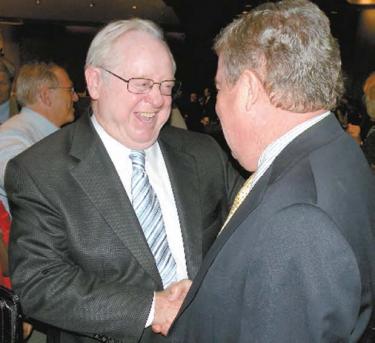 Bakersfield political power broker, philanthropist and former chairman of the Tejon Ranch Company board,  Rayburn ?Ray? S. Dezember is the first hearty handshake of congratulations to Bob Stine, President and CEO of TRC, after the Kern County Board of Supervisor?s unanimous 5-0 vote for Tejon Mountain Village on Monday, Oct. 5.




