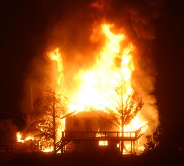  This house at St. Anton and Target in Pine Mountain was destroyed in a major fire that was fully engaged at 3 a.m. on Saturday, Nov. 21. [Hedlund Photos in slide show and above]











