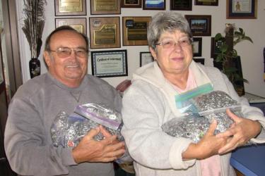 Martin and Rose Kegel brought thousands of pop tops to The Mountain Enterprise to benefit families of sick children.