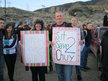 Alex McCue and Joey Teare hold signs for a peaceful demonstration at Frazier Mountain High School on January 27. When Teare was told he could not talk to the media unless he left campus, students said they stayed out of class and continued the sit-in to also protest loss of their free speech rights and unjust treatment of students.