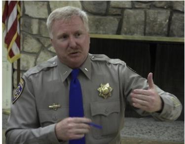 CHP Commander Craig Whitty speaks to Supervisor Ray Watson's appointed municipal advisory council about snow visitors and safety. [photo by The Mountain Enterprise]
