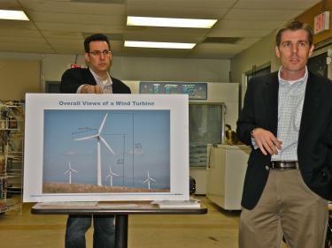 NextEra's wind turbines are shown in this photo presented by the company to the Fairmont Town Council. The illustration gives a vertical measurement of 492 feet at its fully in its fully extended position.