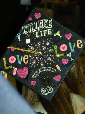 The hats themselves have become works of art for many of the excited graduates. This one was made by ASB President Danielle Culver.[Hedlund Photos]