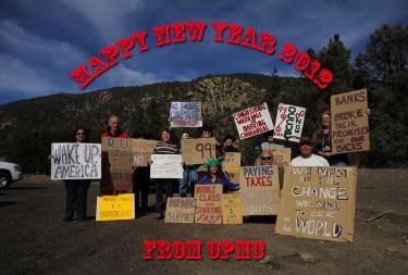 The Occupy movement has come to the mountain and now is hoping to occupy 2012. Above (l-r, rear) Frances Durocher, Graham Heneghan, Susan Maples, Beverly Boyles, Peter Gullerud, Katherine King, Mar Preston, Michael Farrell, Mindy Moffatt; (front) Leslie Bricker, Hoppy Chandler and Bob.