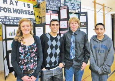 Jamie Bizzini, Josh Arreola, Forrest Csulak and Joseph Chavez were all winners in the Frazier Mountain High School Science Fair who will go on to compete in the Kern County Science Fair. A total of 15 El Tejon Unified School District students will go on to the county event.[Arreola photo]
