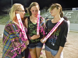 Sierra Hoffman, Hanna Bauer and Kiera Quinto at the Relay for Life Luminaria 
Ceremony. [photo by Patric Hedlund]