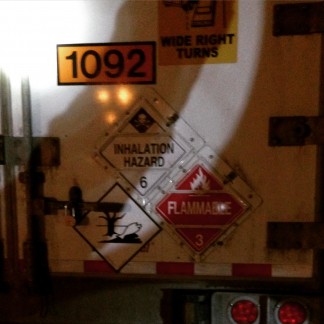 A highly toxic and flammable material, acrolein, was discovered leaking in a trailer that pulled into Tejon Ranch's travel center at Dennis McCarthy Drive on Sunday evening.  The parking lot was evacuated to create a 1500 foot isolation  perimeter.