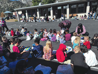 Frazier Park students receiving books during Book Blast 