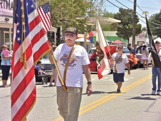 Veterans of VFW Post 9791 in the parade in 2014. [Hedlund photo]