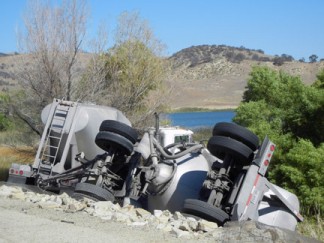 The overturned big rig, photographed by Jeff Zimmerman.