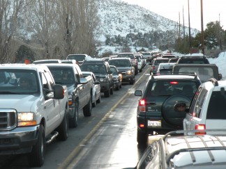 This is Frazier Mountain Park Road on Saturday, Jan. 23, 2010, a weekend when 60,000 snow visitors—according to CHP estimates—appeared on Mountain Community roads. It took 75 minutes to drive from the high school in Lebec to The Mountain Enterprise office in Frazier Park. There was no way for emergency vehicles to get through if there had been a life-threatening emergency.  [Patric Hedlund photo for The Mountain Enterprise] Click the image to see it full size.