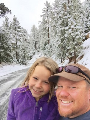 Emily and dad, Jeff Bolton, in the snow on Cerro Noroeste Road, Saturday, Nov. 1 [photo by Jeff Bolton]