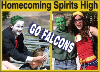 Snapshot from homecoming week in a past year when the theme of the day appears to have been comic book heroes and villains. [photo by Gary Meyer]