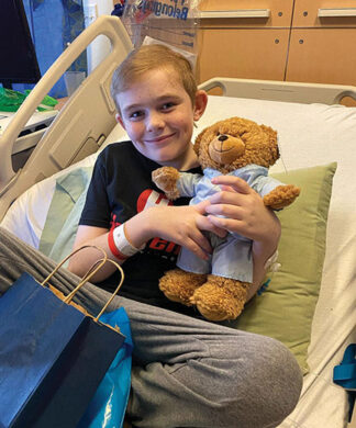 Evan with teddy bear