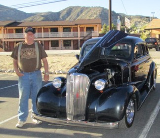 Eli Meigs with his 1937 Chevy Business Coupe at Cruise Night June 27 [photo by Gary Meyer]