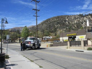 Mt. Pinos Way from La Sierra Restaurant to Monterey Trail was closed for about an hour. [photo by Gary Meyer, The Mountain Enterprise]