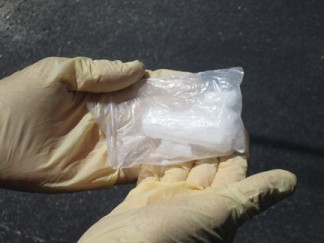 A large shard of methamphetamine found inside an SUV during a traffic stop. [photo by Gary Meyer]