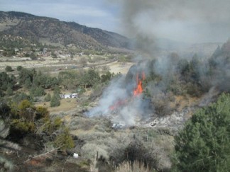 A wide view of the fire on the west end of the Tait Ranch property. [photo by Gary Meyer]