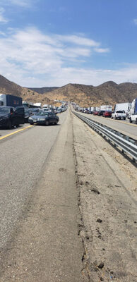  Traffic backed up on the southbound Interstate-5 Wednesday, August 11 for over an hour and 20 minutes south of Gorman, north or Templin Highway due to a shooting incident involving a Los Angeles County deputy.  [photo by Elke Heitmeyer]