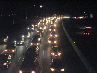 Northbound traffic was backed up for about 1.5 miles Saturday evening after a big rig reportedly jackknifed just north of El Tejon School. [photo by Gary Meyer]