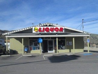 Sam’s Liquor and the Gorman Plaza Market had cigarettes stolen. They are among a growing list of victims of burglaries along the Interstate 5. [Gary Meyer photo]