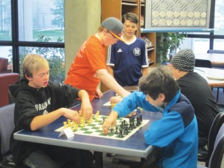 The popular chess tournament continues this Saturday. [photo by Gary Meyer]