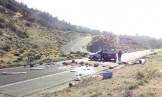 the scene of the May 2012 crash just 30 seconds after it happened.  The crash created quite a mess as a PT Cruiser and a pickup truck loaded with supplies collided. This is also the site of ‘Bear’s Corner’ where Barry ‘Bear’ Weksler died in 2005 after trying to avoid a collision with two other vehicles. [photo by Gary Meyer]
