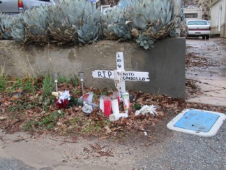 This small shrine has been set up on South Drive in Lebec near where Benito Carrillo died. It is placed across the street from Steve Gilmore’s home. Gilmore himself has been in jail since the night of the shooting. He is being held on $1 million bail. [photo by Gary Meyer, The Mountain Enterprise]