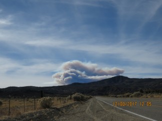 This is what Bill Buchroeder saw driving west on Lockwood Valley Road toward Highway 33 on Friday, Dec. 8, just after noon. Highway 33 is a route to Ojai, but has been closed now due to fire danger. The Thomas fire was moving toward Ojai yesterday. Though this looks close, the fire is still two mountain ranges away.