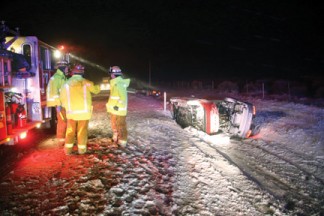 Two cars on their sides off of Highway 138 near Neenach. [photo by Jeff Zimmerman]