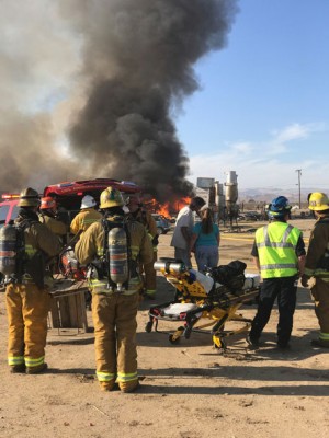 A fire structure fire burns near Antelope Acres at 40th Street West and Avenue C in Lancaster. Los Angeles County Fire Department responded to the scene. [Photo by Jeff Zimmerman]