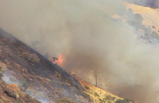 Fire crews are trying to keep the fire out of the drainage leading into Digier Canyon.  [photo by The Mountain Enterprise]
