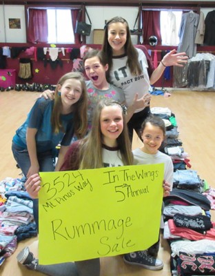 Dance studio students on duty at the rummage sale are (front, l-r) Sadie Thomason, Quinn Dever, (back) Elizabeth Arthur, Alaina Shillig and Hannah Gomez. [photo by Gary Meyer, The Mountain Enterprise]
