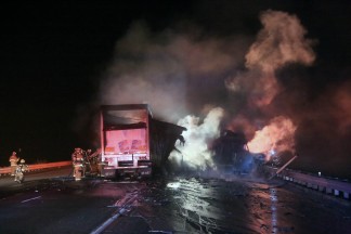 Multiple big rigs crashed early Thursday morning between 2 and 3 a.m. on the Interstate 5 between Lebec and the Grapevine exit. All the vehicles and their contents were destroyed. One driver was transported by ambulance. [Jeff Zimmerman photo]