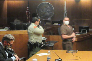 Villalpando escorted from the courtroom