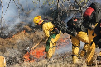 Firefighters working on the Ridge Route fire came upon human remains Saturday. [photo by Jeff Zimmerman]