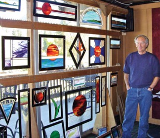 Michael Foster of Pine Mountain works with stained glass. He showed his wares at the Pine Mountain Club Craft Faire Saturday, Nov. 30. [photo by Patric Hedlund]