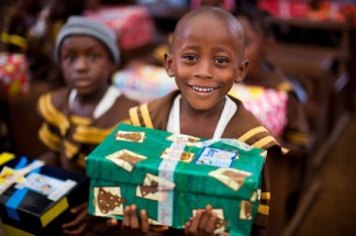 Children around the world are tickled by thoughtful gifts such as the shoebox Christmas. [Operation Christmas Child photo]