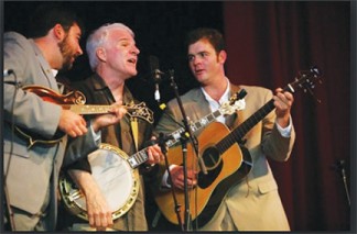 Comedian and banjo player Steve Martin with some of his band.