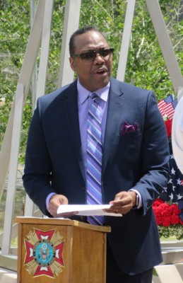 Terrence Alexis of National Cement speaking at the May 29, 2017 Memorial Day ceremony. [photo by Gary Meyer, The Mountain Enterprise]